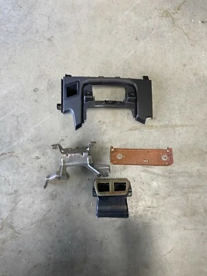 2011-2016 FORD F250 F350 F450 SUPERDUTY CENTER CONSOLE FLOOR & DASH BRACKET TRIM - Image 1 of 3