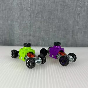 Hot Wheels Lot Of 2 Purple And Green Car Diecast Vehicle 2013 Mattel - Picture 1 of 12