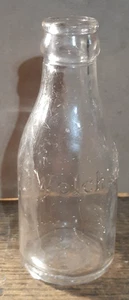 Bottiglia di vetro succo d’uva Welch’s vintage in rilievo misura junior 5” bottiglia scavata - Foto 1 di 3