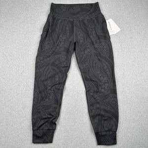 Pantalones de chándal Athleta Salutation texturizados nuevos con etiquetas para mujer legging mediano negro gris - Imagen 1 de 11