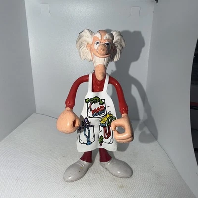 1987 Mad Scientist Arco - Figura de goma giratoria flexible roja con delantal Foto 1 de 4