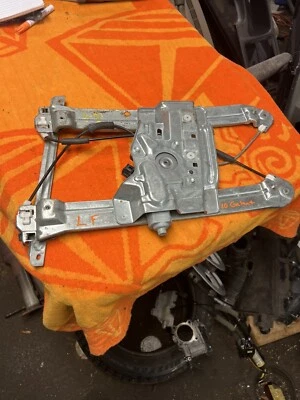 2004-2012 Mitsubishi Galant LH conductores puerta delantera ventana regulador y conjunto motor. Foto 1 de 4