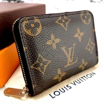 Monedero Louis Vuitton con monograma y cremallera M60067 4,3*3,1*0,9 pulgadas Foto 1 de 4