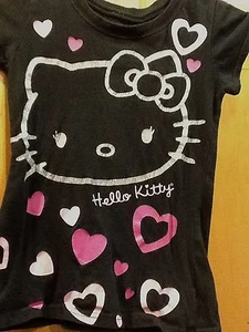 CAMISETA NIÑA HELLO KITTY NEGRA CON CONTORNO PLATEADO BRILLANTE KITTY 6-6X - Imagen 1 de 4