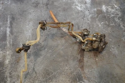 Suzuki TC90 2 cycle oil pump, with lines, OEM, used. - Image 1 of 3