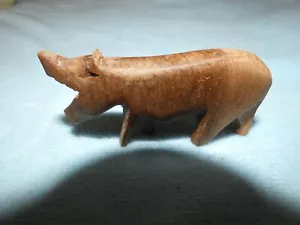 WOODEN CARVED ANIMAL  SMALL ROUGHLY CARVED HIPPO 89G 8 X 4 X 1 CM - Picture 1 of 3