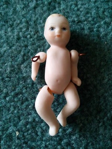 Beautiful Articulated Sprung Small Porcelain Dolls House Baby Doll - Picture 1 of 5