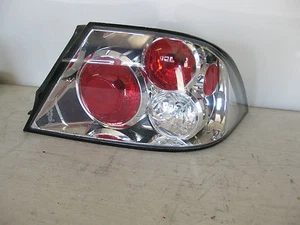 Luz trasera lateral derecha Mitsubishi Eclipse 99-03, buen estado - Imagen 1 de 4