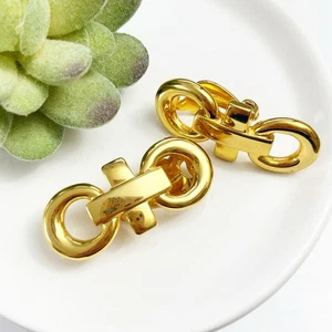 Vintage Givenchy Gold X and O Clip Earrings - Picture 1 of 8