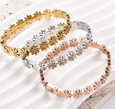 Stainless Steel  Flower Bangle gold ,rose gold or silver with CZ s - Image 1 of 3