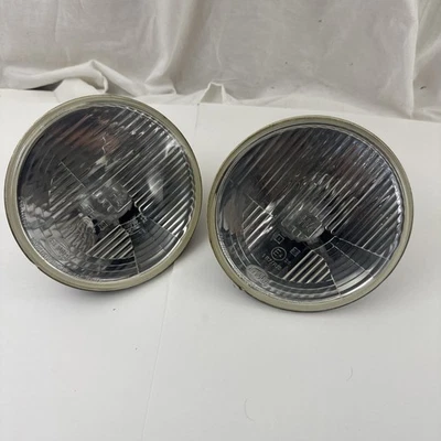7" Headlights Round Hella H4 Conversion Housings (2) USED E4 R20 1R7 R20 - Image 1 of 4
