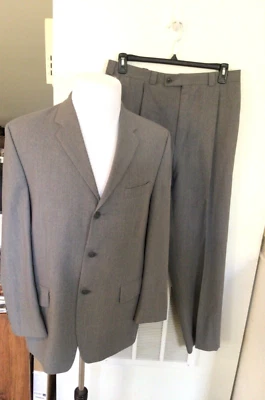 Traje de hombre DKNY Essentials gris liso lana 3 botones 2 piezas talla 40R pantalones 34x30 Foto 1 de 4