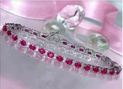 Brazalete de tenis de diamantes rubí rojo corte ovalado de 14 quilates acabado en oro blanco de 14 quilates Foto 1 de 4