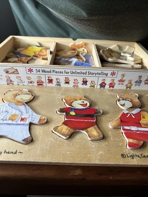 Melissa & Doug Lights, Camara, Action! Bear Family Dress Up 54pc Development Toy - Image 1 of 4