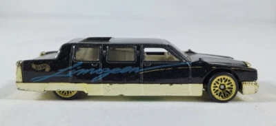 LIMUSINA VINTAGE HOT WHEELS 1990 PINTURA NEGRA COCHE FUNDIDO A PRESIÓN LIMUSINA Foto 1 de 4