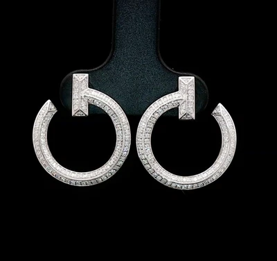 Auténticos pendientes de aro abiertos Tiffany & Co T 1 de oro blanco de 18 quilates con diamantes Foto 1 de 4