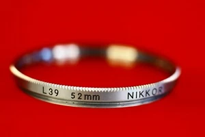 TOP MINT RARE ORIGINAL NIKON NIKKOR SILVER CHROME L39 FILTER 52MM PRISTINE GLASS - Picture 1 of 4