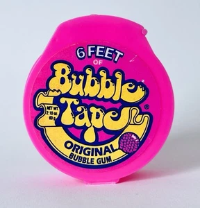 "Contenedor de goma con rollo de cinta de burbujas Amurol 1990 vintage 3"" caramelo PAT. VARIANTE PENDIENTE - Imagen 1 de 4