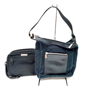 tumi men's clutch bolsa
