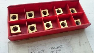 10 Kennametal Hartmetall Fräseinsätze CNHU1005 KC735M ( CNHU 1005 CNHU 10 05 ) - Bild 1 von 2