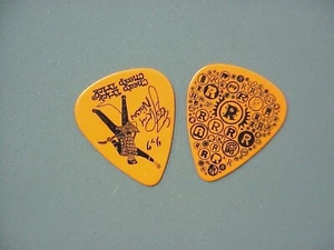 Cheap Trick guitar pick black on orange Rick Nielson has the R multiple times! - Picture 1 of 1