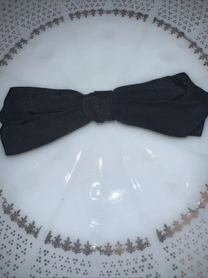 Pajarita con clip negra Grip Tite NYC de colección Foto 1 de 2