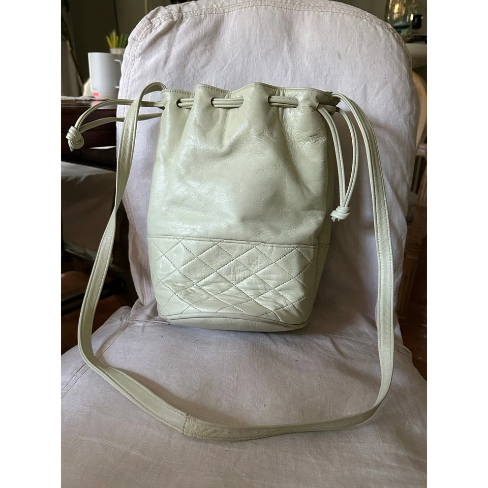 Vintage leather bucket bag crossbody quilted light green drawstring hobo pastel  - Image 1 of 4