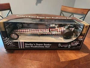 SHELBY SUPER SNAKE TOP FUEL RAIL DRAGSTER - AUTOGRAPHED DON PRUDHOMME 1:24 NIB - Picture 1 of 2