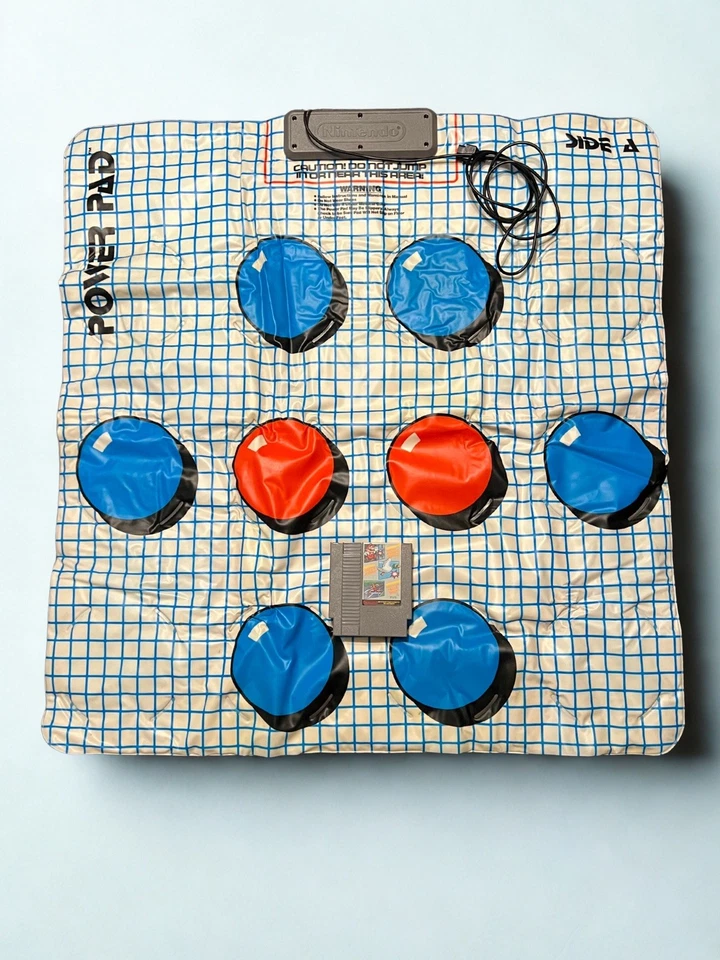 Cartucho Nintendo Mario/Duck Hunt/World Class Track Meet (1988) + Power Pad Foto 1 de 4