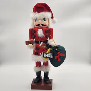 Christmas Santa Nutcracker Holding Bag of Hershey Candy Bars Reeses Chocolate - Picture 1 of 7