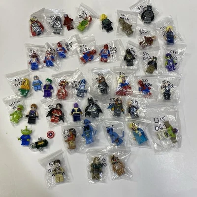 LEGO LOT OF 43  SUPER HERO, DISNEY,  TOY STORY MINIFIGURES GHOST BUSTERS - Image 1 of 4