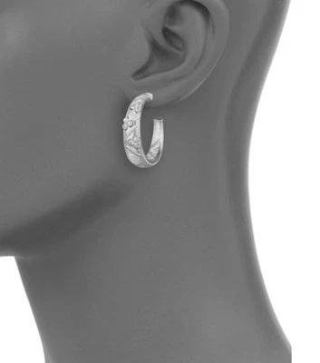 Pendientes de aro Judith Ripka góticos de zafiro blanco y plata de ley de 17 gramos $485 Foto 1 de 3