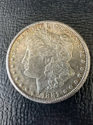 1881 CC $1 dólar de prata Carson City Morgan alto grau raro! Tonificado - Imagem 1 de 2