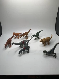 Lot of 8 Jurassic Park Small Toy Dinosaurs FPX90 Raptor T Rex Carnotaurus - Picture 1 of 6