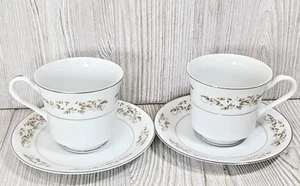 International 326 Springtime 2 Tea Cups & Saucers White Flowers Platinum - Picture 1 of 9