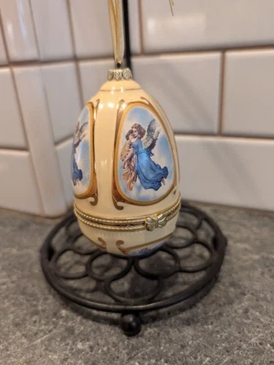Caja de música Valerie Parr Hill Mr Christmas porcelana huevo adorno caja e información FUNCIONA Foto 1 de 4
