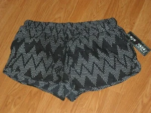 MINI PANTALÓN CORTO ENCUBRIMIENTO EYE CANDY TALLA M JUNIOR ESTAMPADO NEGRO NUEVO CON ETIQUETAS - Imagen 1 de 1