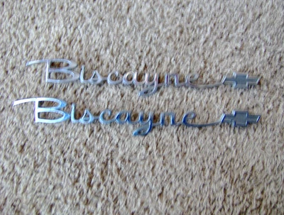 1963 63 Chevy BISCAYNE rear quarter emblems 4886814 - Image 1 of 2