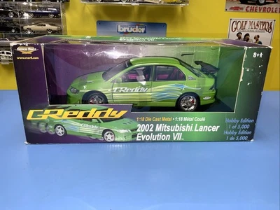AMERICAN MUSCLE  ERTL  2002 MITSUBISHI LANCER EVO VII  HOBBY EDITION 1 OF 5000   - Image 1 of 4