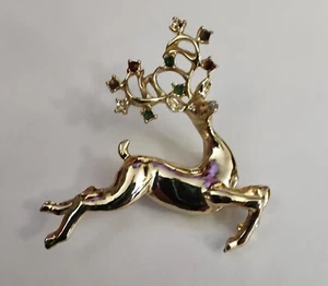 Vintage Reindeer 11 W 30th St Dodd’s Christmas Brooch Pin Gold Tone - Picture 1 of 3