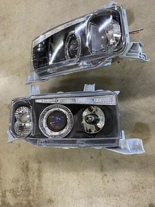2004-2007 Scion xB Halo Projector Black Housing Headlamps - Picture 1 of 5