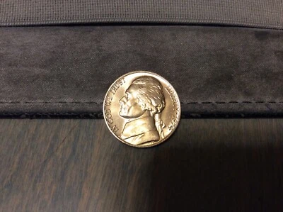 1974,Gold toning,BU,Full Steps,Jefferson nickel,Only the coin on the left **** - Image 1 of 3