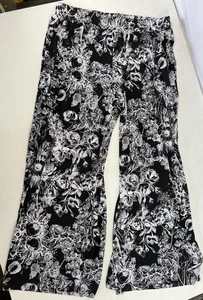 G.I.L.I Damen Jetsetter schwarz Blumen Toile weiter Schlitz Bein Hose Größe L - Bild 1 von 5