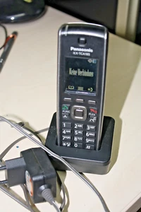 Panasonic KX-TCA185CE DECT-Mobilteil inkl. Netzteil + Ladeschale - Bild 1 von 1