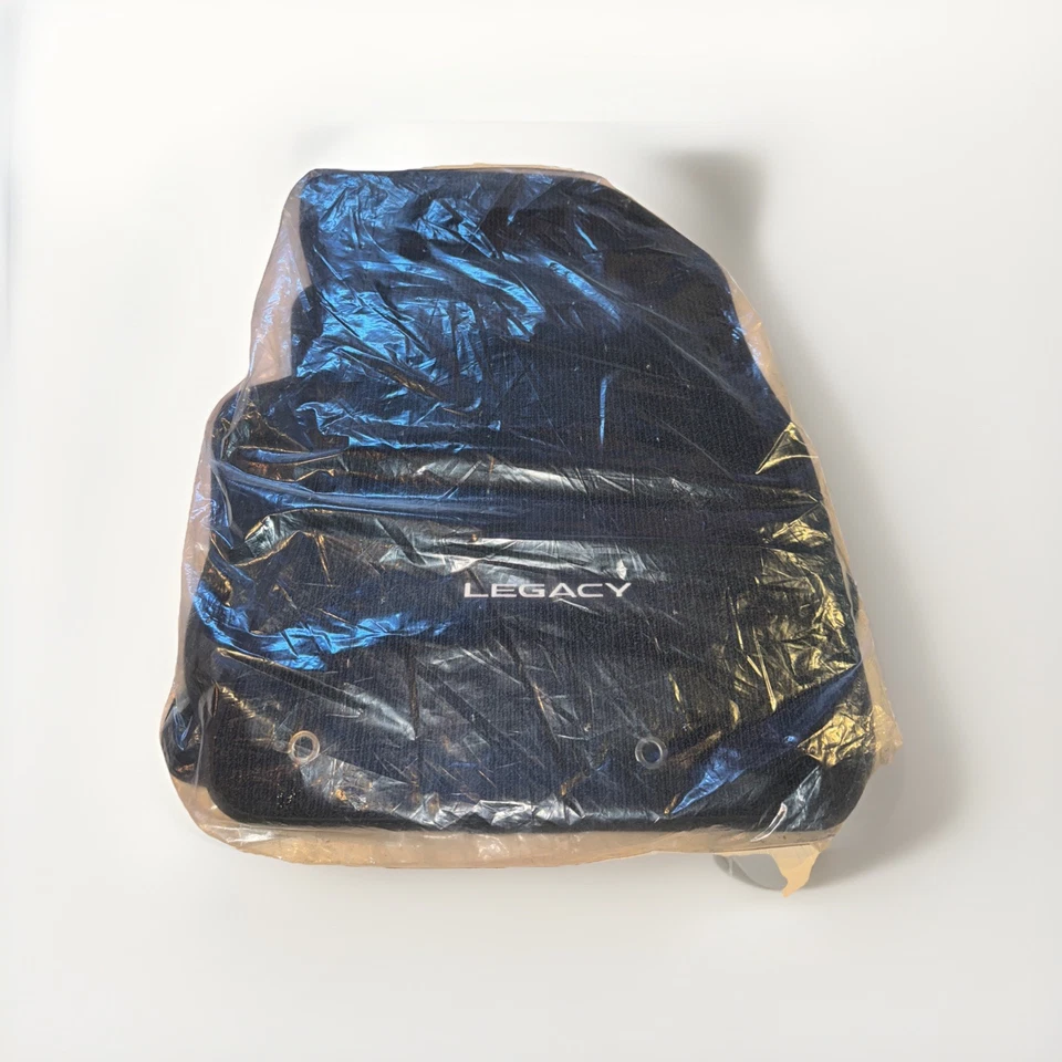 NUEVO JUEGO DE 4 ALFOMBRILLAS SUBARU LEGACY OEM J501SAL100 NEGRAS GENUINAS Foto 1 de 4