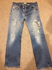 Distressed Freyed/Ripped Levi’s 501 Button fly, Regular. W34 Leg 32