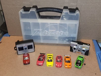 Vtg TOMY TOMICA BIT CHAR-G Micro R/C CAR & Zip Zaps Radio Shack w/Remote + Case - Image 1 of 4