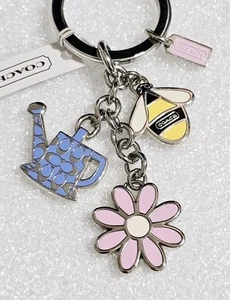 NEW Coach Cluster Garden Mix Silver Keychain Bag Key Fob Bee Daisy Watering Can - Picture 1 of 8