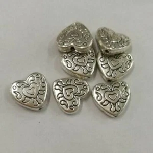 Cuentas espaciadoras en forma de corazón de 2 caras hechas a mano color plata envejecida de 11 mm 16 un. H0743 - Imagen 1 de 1