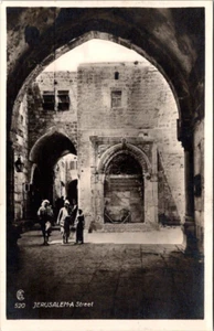 Postcard RPPC Jerusalem - A Street People in Street Scene Archways - Picture 1 of 2